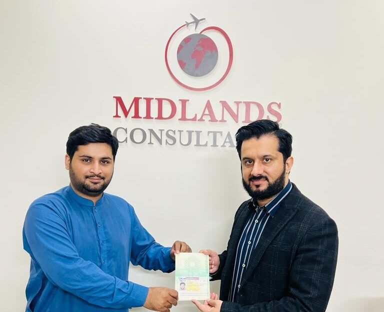 Mr. Ansar Ali receiving UK study visa approval from CEO - Study in UK from Pakistan