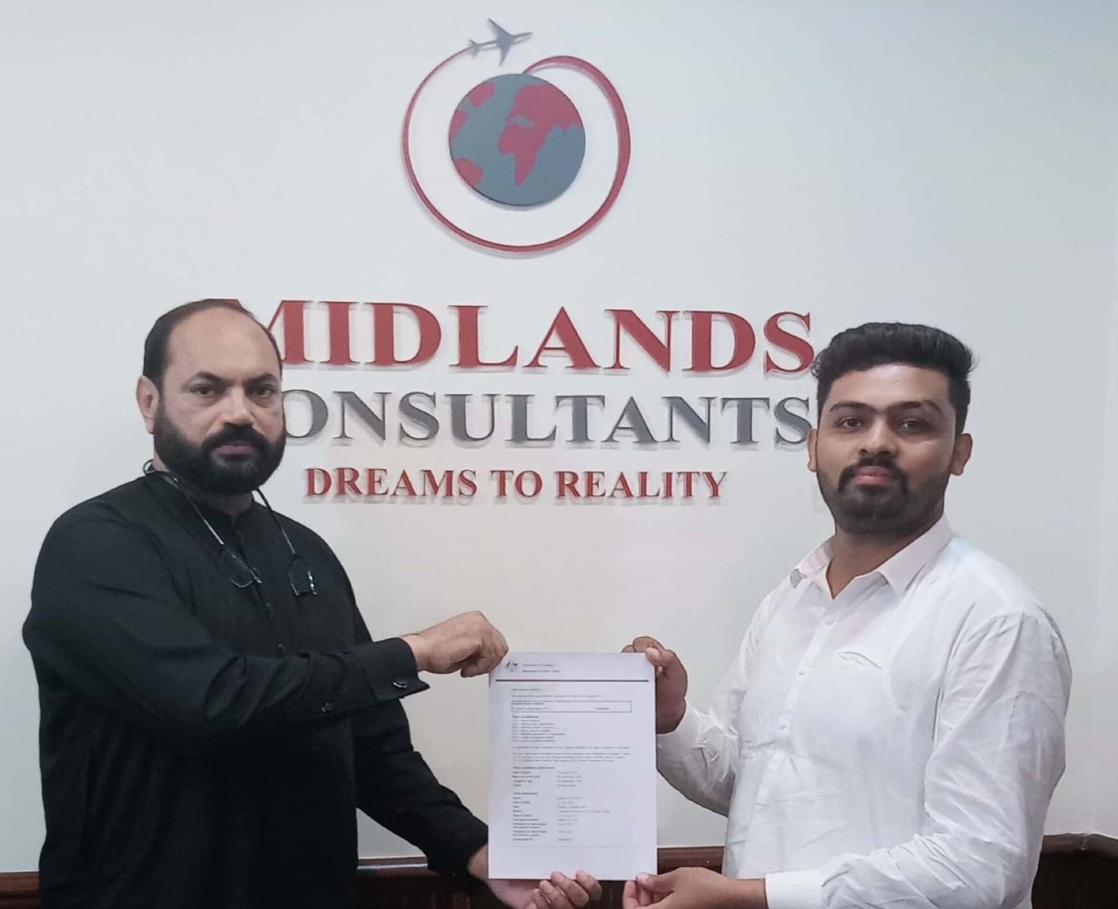 Mr. Hamza Shaheen receiving Australia study visa grant from Team Midlands - Study in Australia from Pakistan
