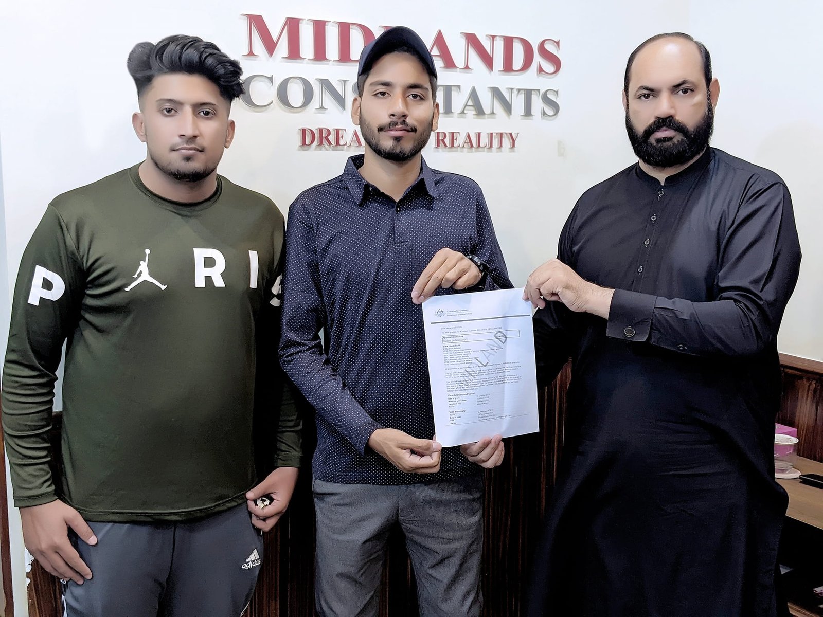Mr. Muhammad Adeel receiving Australia study visa grant from Team Midlands - Study in Australia from Pakistan