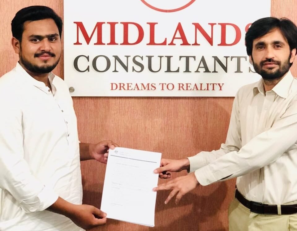 Mr. Adeel Abbas receiving Australia study visa grant from our Director - Study in Australia from Pakistan